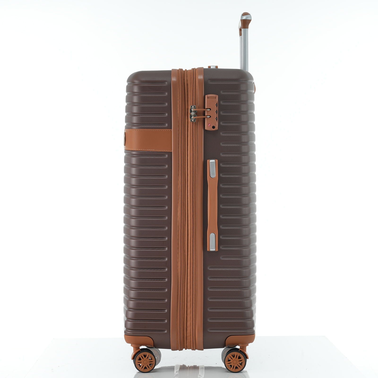 HouseOfZazla hard-shell brown luggage with tan faux leather straps and padlock on Tampa Home & Garden Store