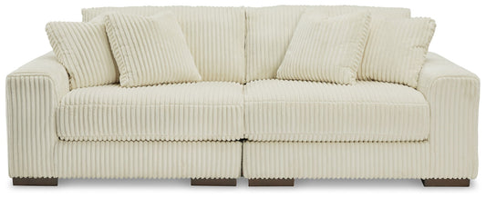 Lindyn Sectional by Unique Piece Furniture in cream ribbed corduroy with matching cushions on Tampa Home & Garden Store