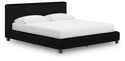 Zuraleus Upholstered Bed by Unique Piece Furniture in black ribbed fabric with tall headboard on Tampa Home & Garden Store