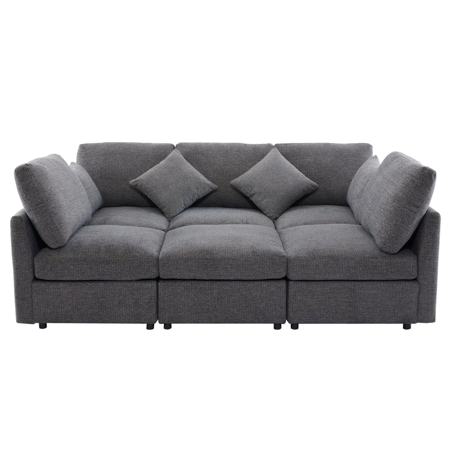 Gray modular sectional sofa with multiple back cushions and coordinating throw pillows on Tampa Home & Garden Store