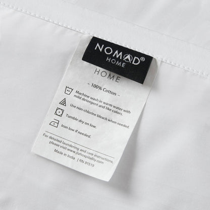 King Cotton Sheet Set white with NOMAD HOME label visible on Tampa Home & Garden Store