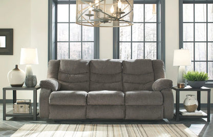 Tulen reclining sofa in gray textured fabric, plush three-seat seating in a bright living room on Tampa Home & Garden Store