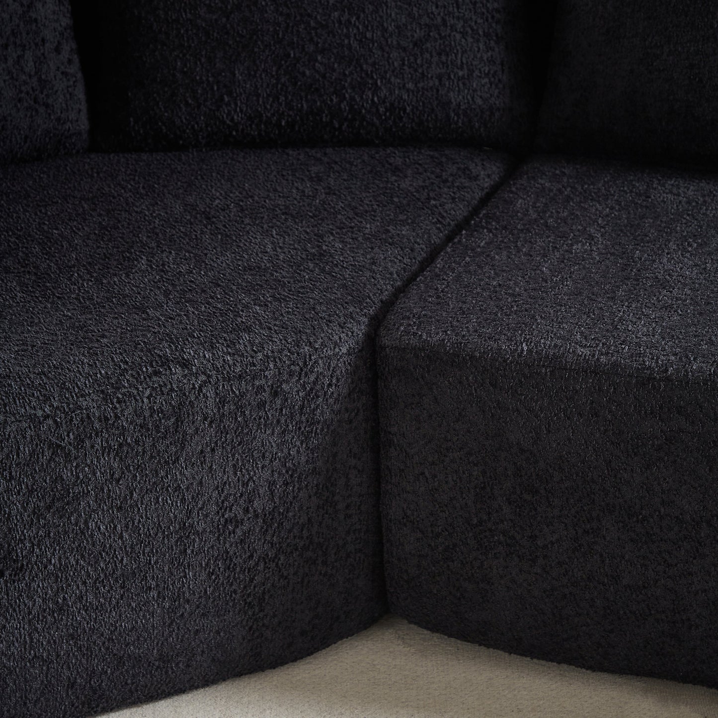 the V-Shaped and Modular Sofa in Chenille Fabric