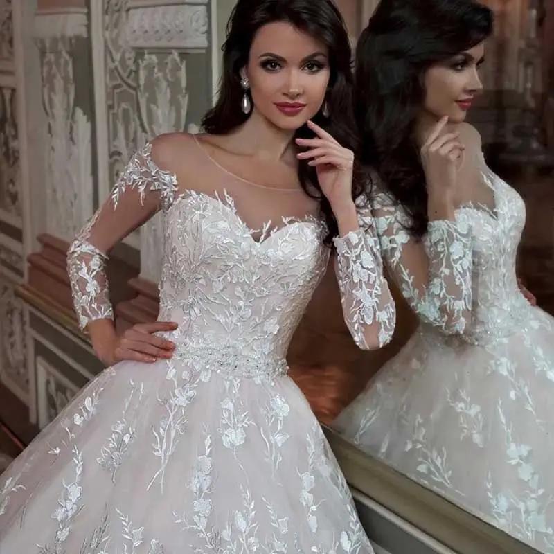 Wedding gown white lace with sheer illusion neckline and long floral lace sleeves on Tampa Home & Garden Store