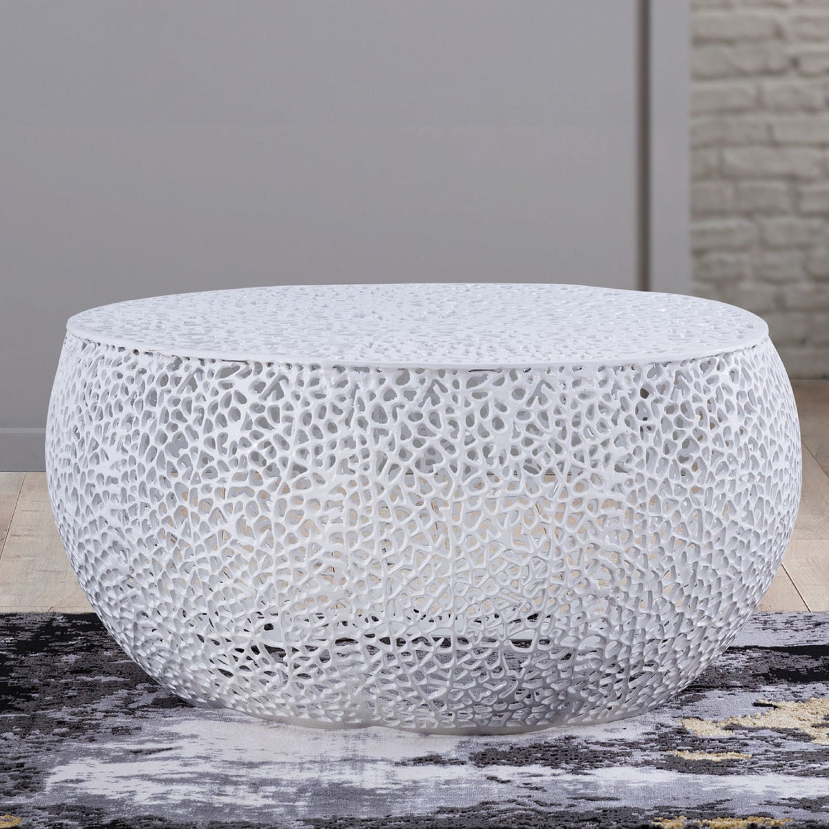 Round coffee table with aluminum frame in white lattice design on Tampa Home & Garden Store
