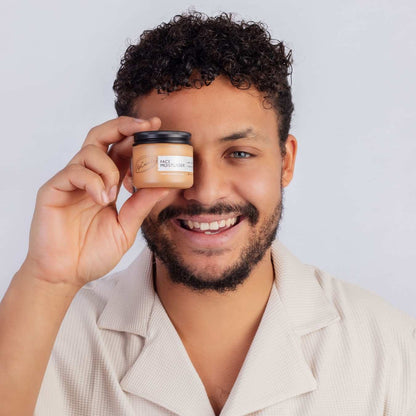 Hydration Skincare Set UpCircle peach jar face moisturiser with black lid held by smiling man on Tampa Home & Garden Store