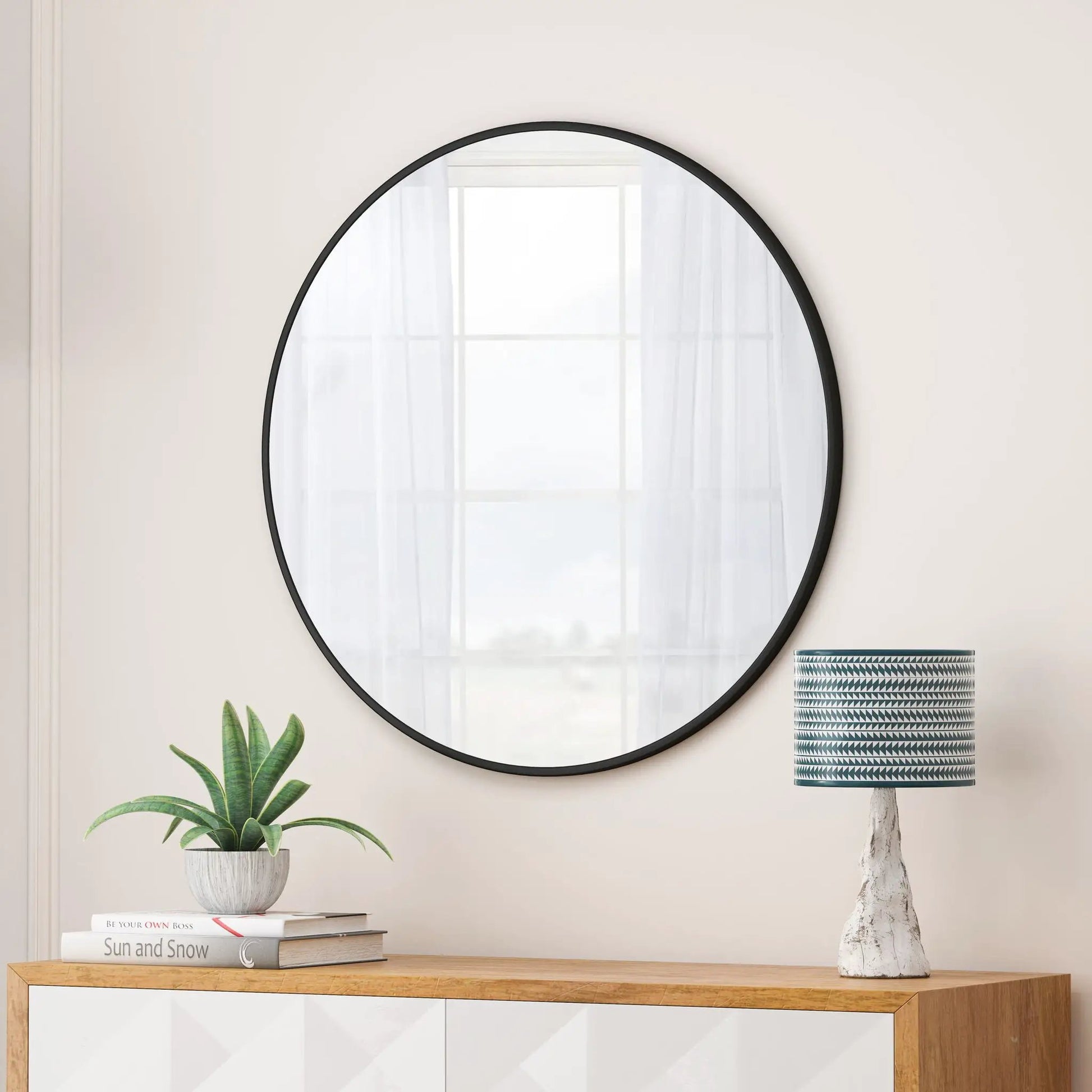 Round wall mirror with black metal frame, contemporary vanity mirror for bathroom or living room on Tampa Home & Garden Store