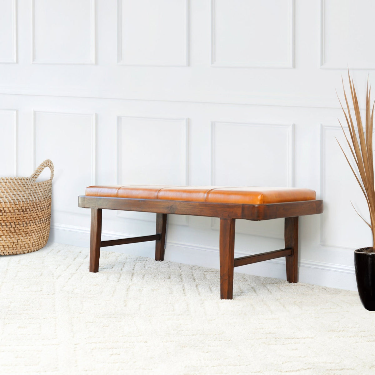 Rustic upholstered bench with tan genuine leather cushion and dark wood legs on Tampa Home & Garden Store