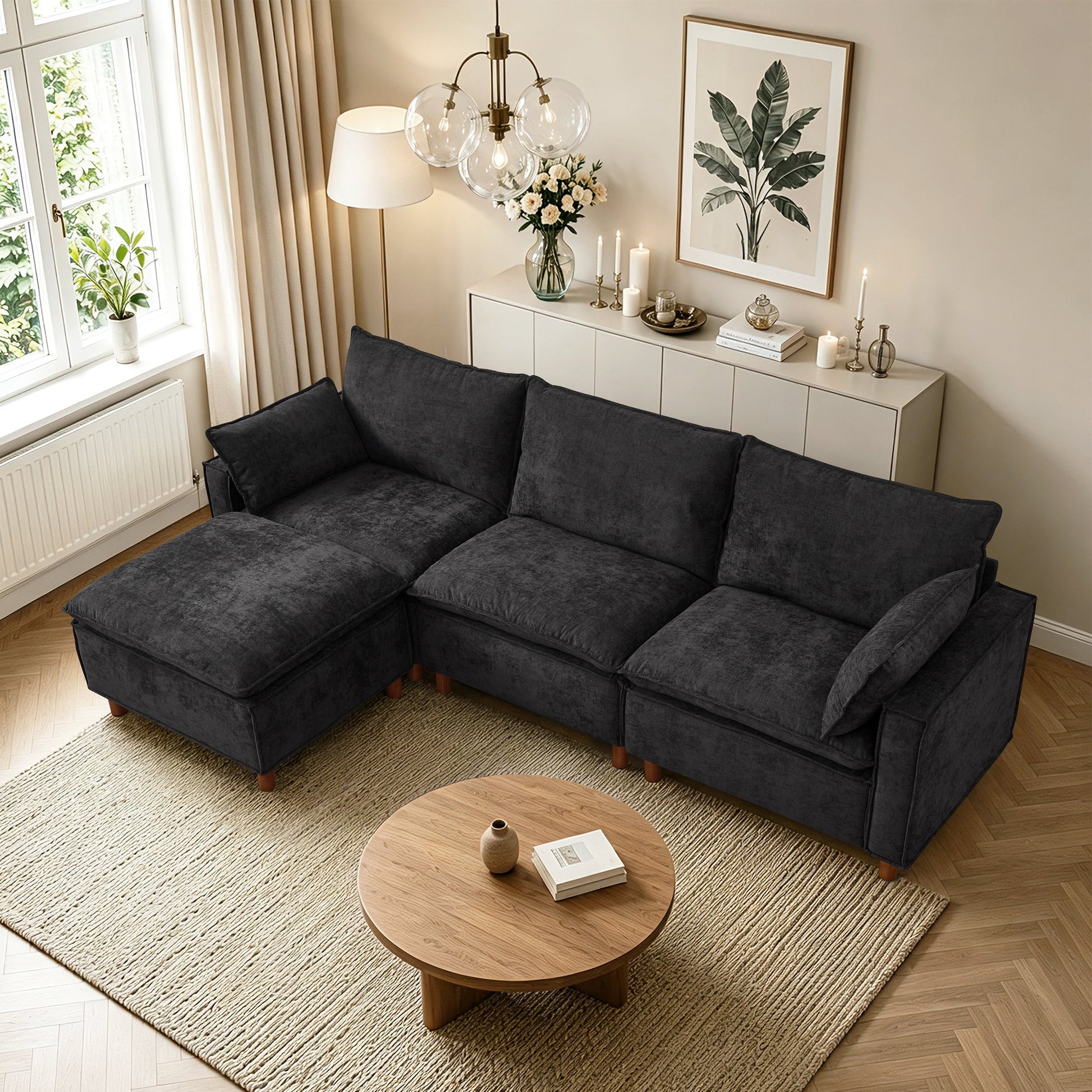 108.5-inch modular L-shaped sectional sofa with movable ottoman in dark charcoal fabric on Tampa Home & Garden Store