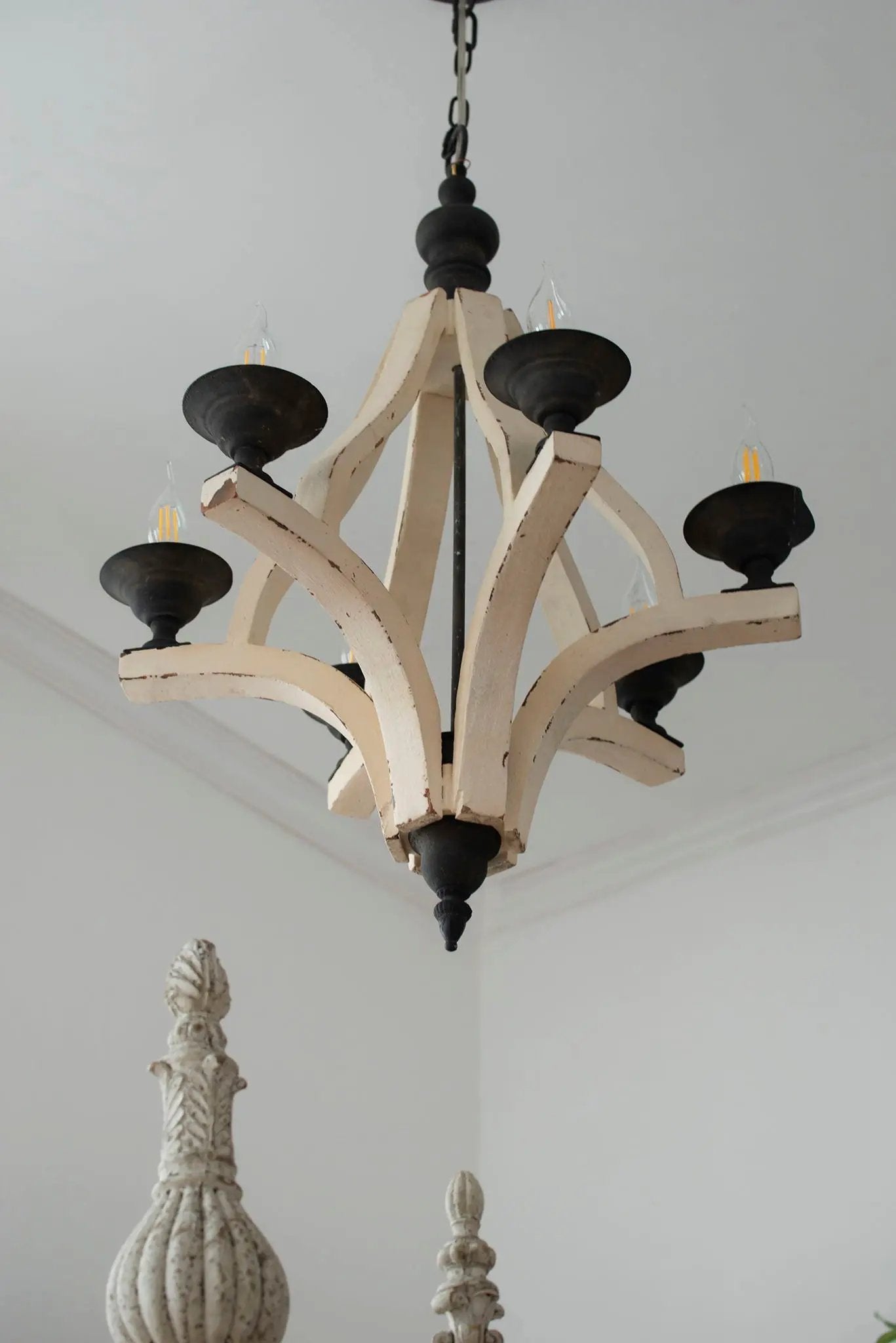 6-light cream wood chandelier with curved arms and black cup holders, adjustable chain on Tampa Home & Garden Store