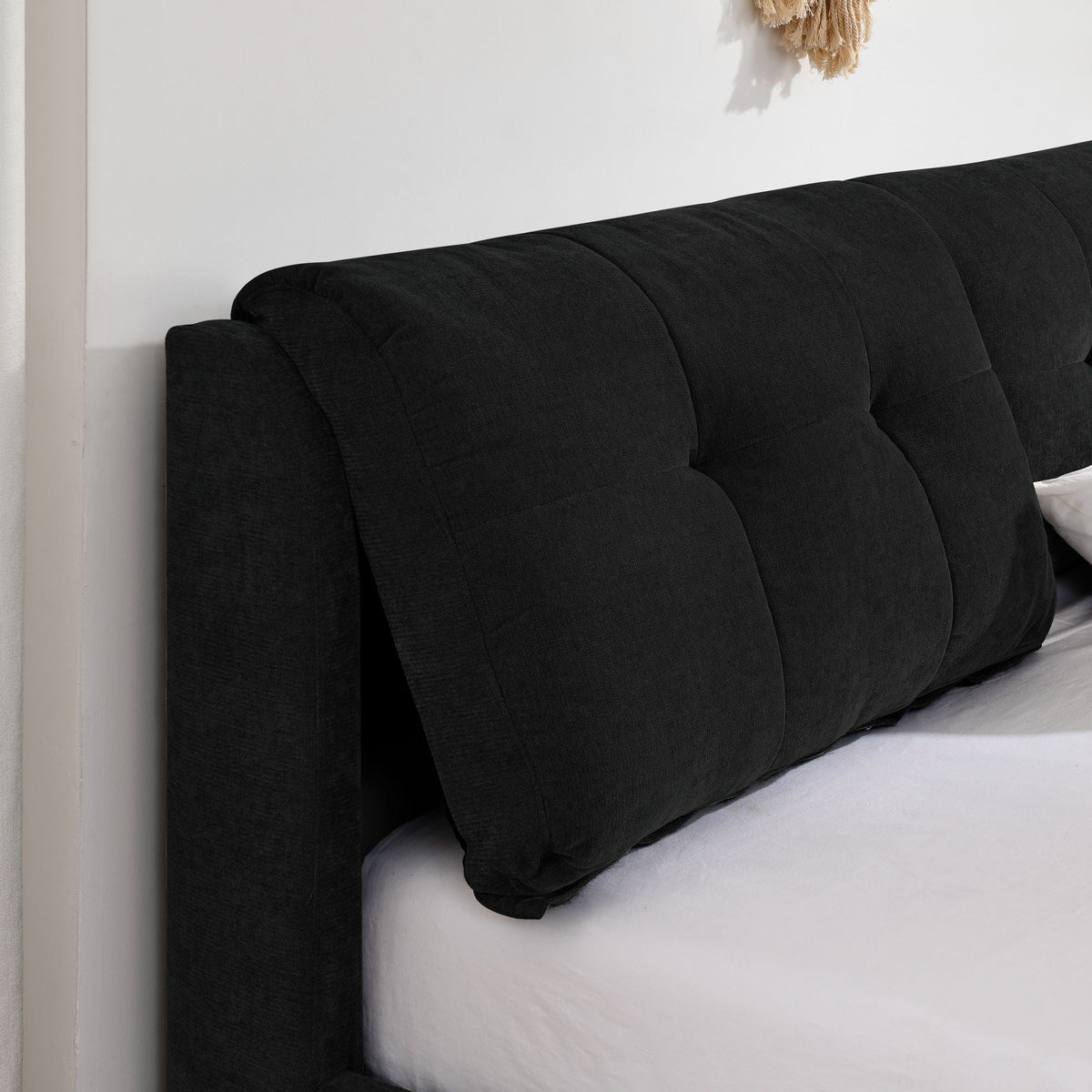 Storage hydraulic platform bed with integrated headboard, black tufted fabric side view on Tampa Home & Garden Store