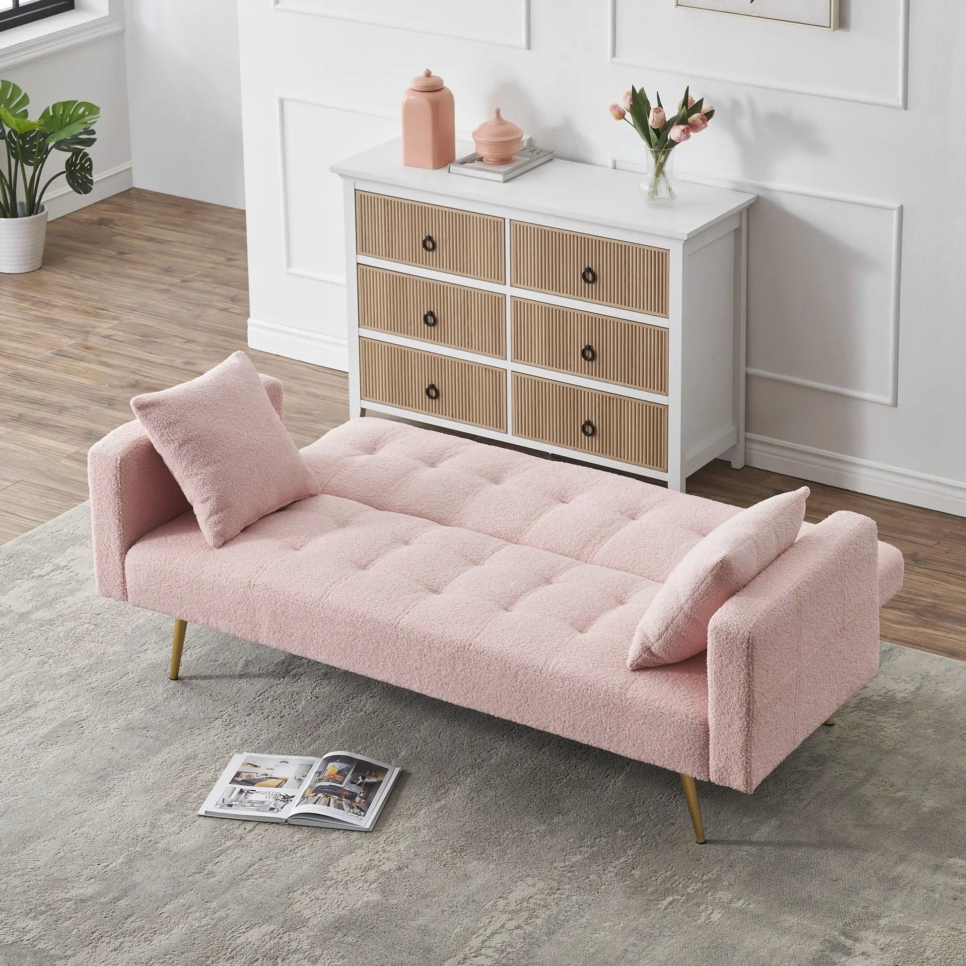 Teddy Fleece Futon Sofa Bed by Unique Piece Furniture in pink with plush pillows on Tampa Home & Garden Store