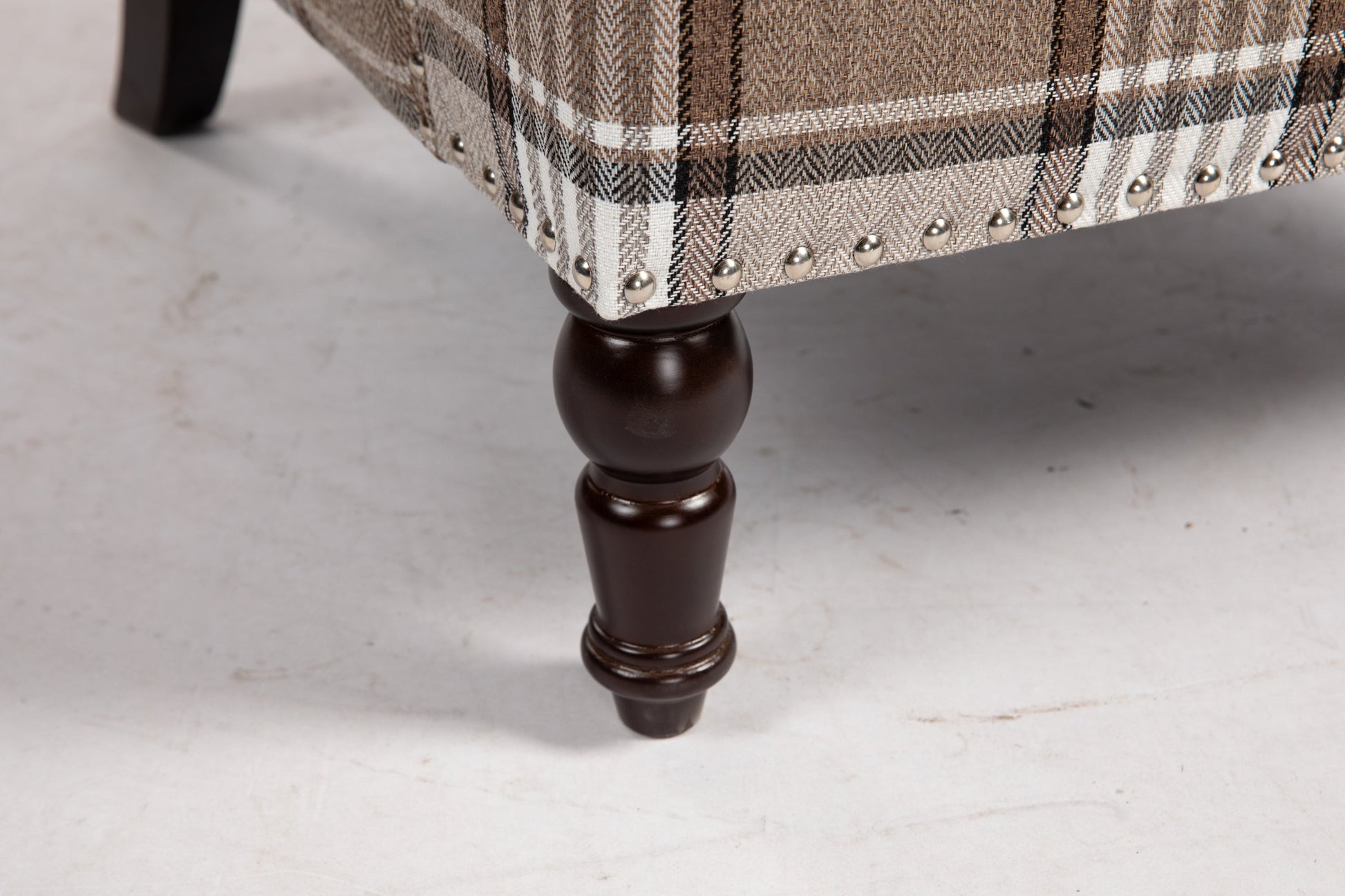 Upholstered accent chair with brown linen fabric and nailhead trim, dark wood turned leg on Tampa Home & Garden Store