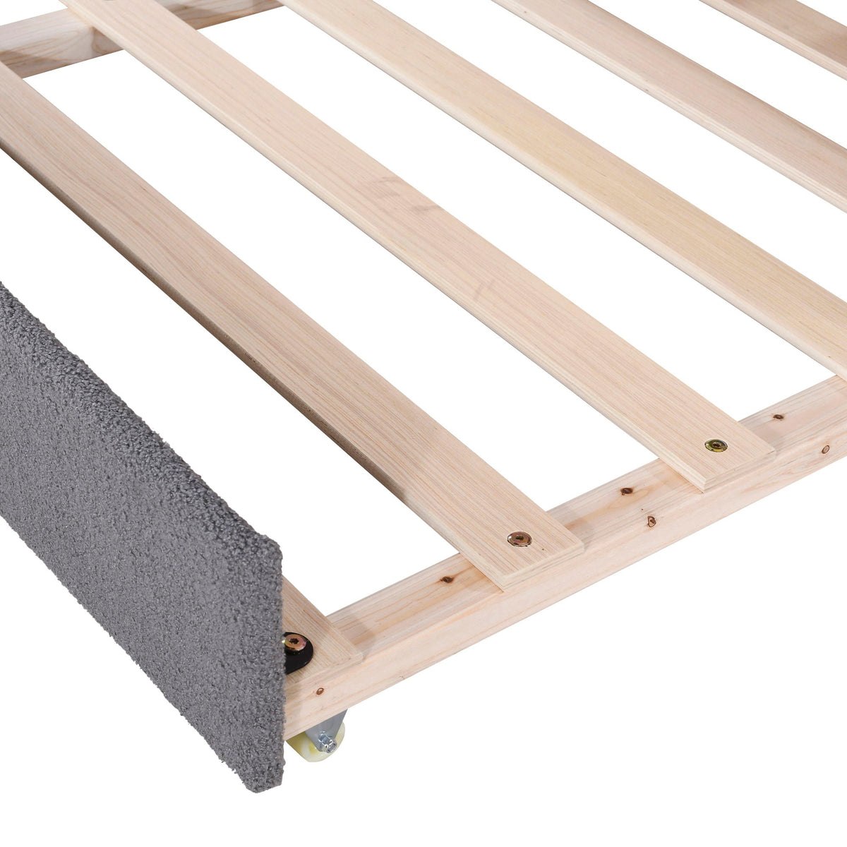 Trundle bed frame by HouseOfZazla with light wooden slats, visible screws and casters beside a gray rug on Tampa Home & Garden Store