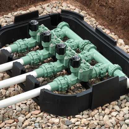 Orbit Irrigation 4-valve preassembled manifold with PVC adapters, green body, black actuators on Tampa Home & Garden Store