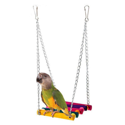 Colorful suspension bridge swing for birds with bright wooden planks and metal chains on Tampa Home & Garden Store
