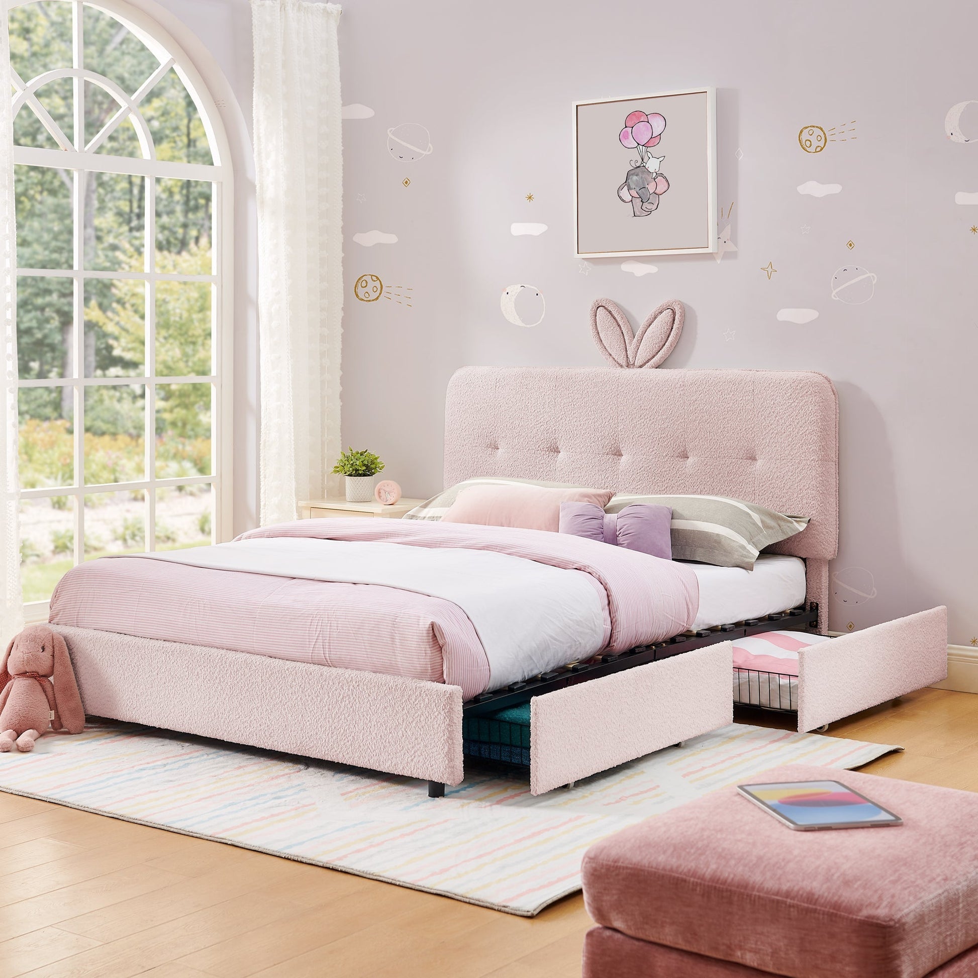 Full-size kids upholstered bed with oversized rabbit-ear headboard in soft pink fabric on Tampa Home & Garden Store