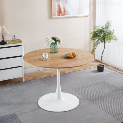 Mid-Century Tulip Dining Table with Round Top, light wood top and white pedestal base on Tampa Home & Garden Store