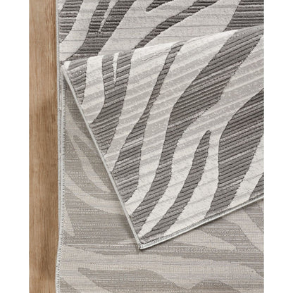 Gray geometric area rug with ultra-soft fibers in a modern neutral palette on Tampa Home & Garden Store