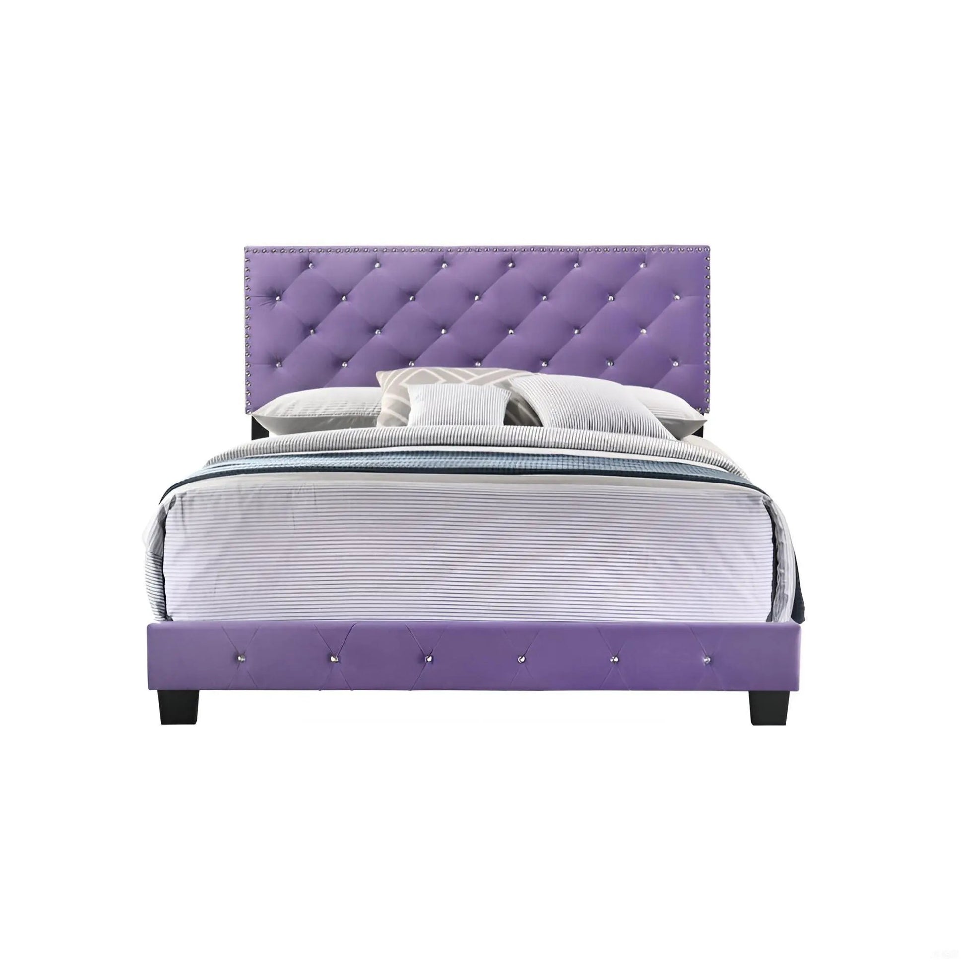 Luxurious upholstered bed with purple tufted headboard and nailhead trim; striped bedding on Tampa Home & Garden Store