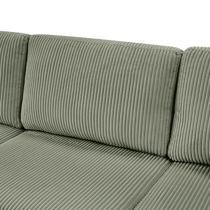 Oversized sectional sofa close-up featuring grey-green corduroy upholstery with vertical ridges on Tampa Home & Garden Store
