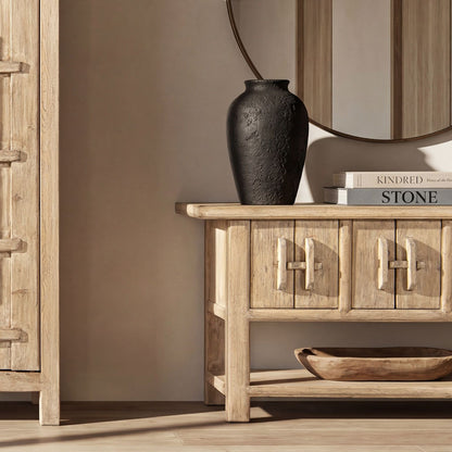Reclaimed pine sideboard with lower shelf in natural finish, topped with a black vase and books on Tampa Home & Garden Store
