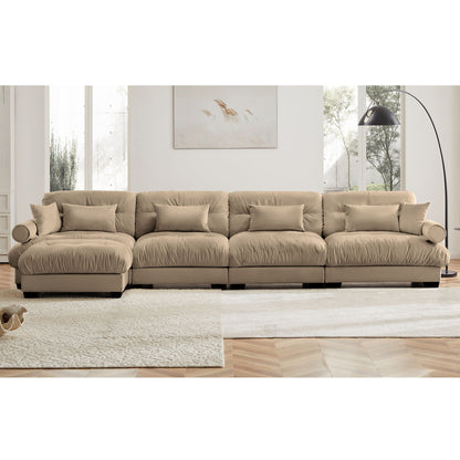 Beige modern sectional sofa with ottoman, round bolster arms and plush pillows on Tampa Home & Garden Store