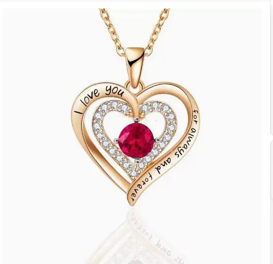 Gold-tone heart pendant necklace by FLIPSTYLEZLLC with crystal outline and red centerpiece on Tampa Home & Garden Store