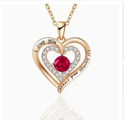 Gold-tone heart pendant necklace by FLIPSTYLEZLLC with crystal outline and red centerpiece on Tampa Home & Garden Store