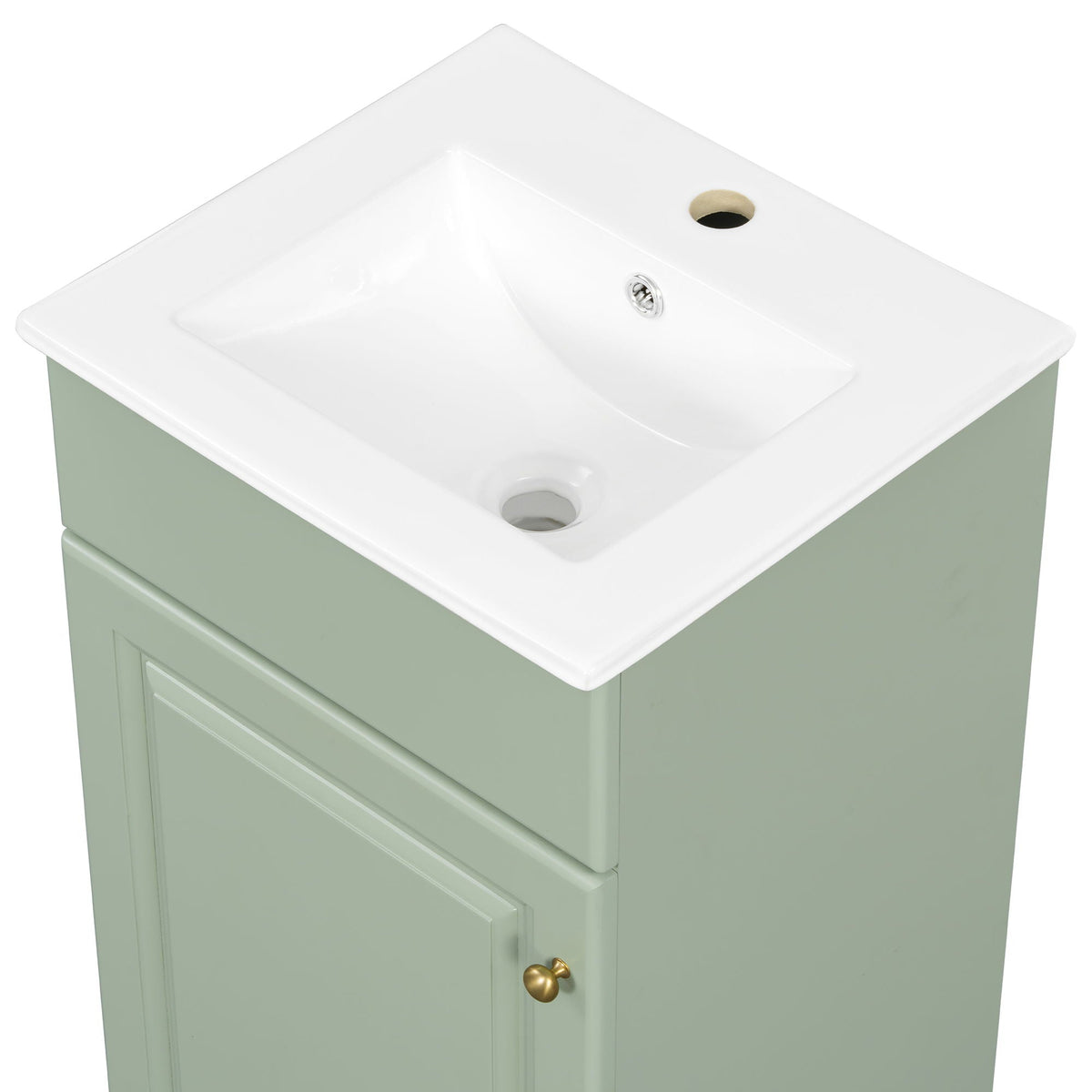 Bathroom vanity with white sink top on sage green cabinet with brass knob on Tampa Home & Garden Store