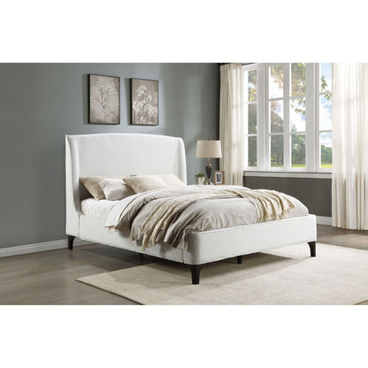 Theodore Wingback Bed white upholstered by HouseOfZazla in a gray bedroom with neutral bedding and large windows on Tampa Home & Garden Store