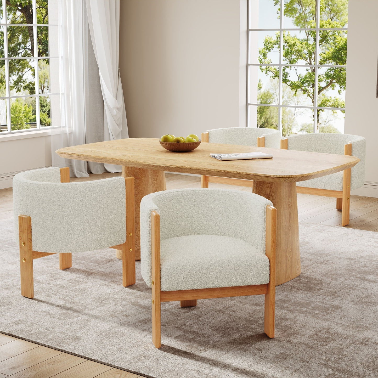 Modern dining chairs set of 4 in white boucle fabric with light wood legs around a table on Tampa Home & Garden Store