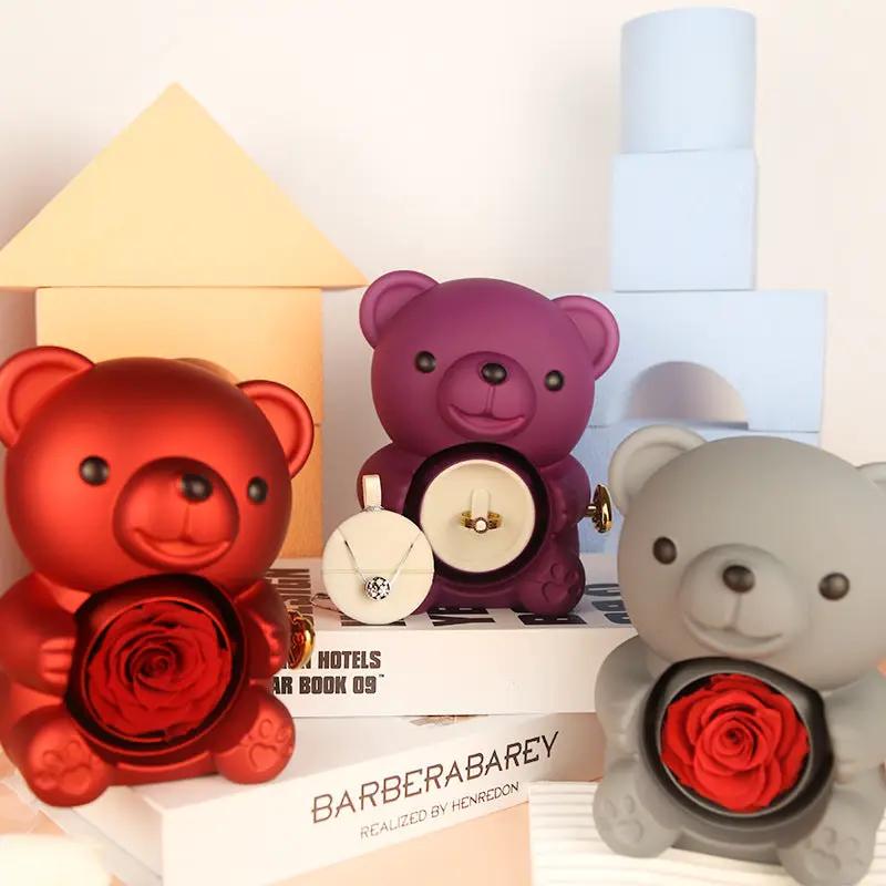 Three teddy bear jewelry boxes in red, purple and gray with rose centers and a necklace ring box on Tampa Home & Garden Store