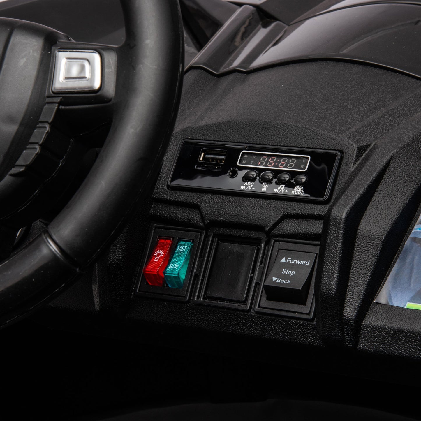 Side by Side 4x4 ride-on dashboard with steering wheel and red/green controls on Tampa Home & Garden Store