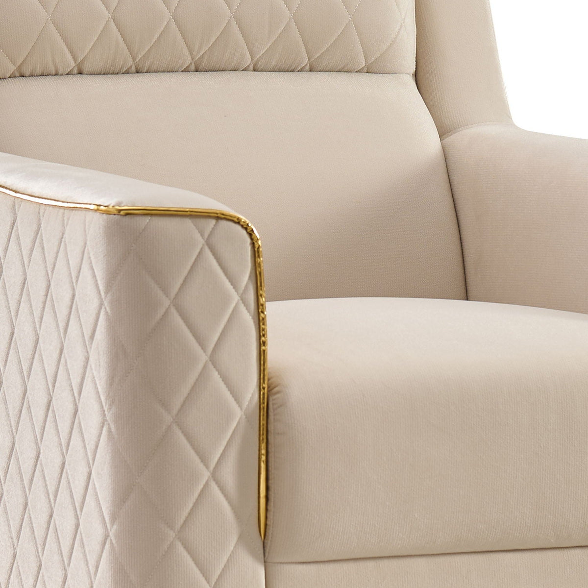 Beige upholstered sofa with diamond quilted back and gold-tone trim on arm HouseOfZazla on Tampa Home & Garden Store