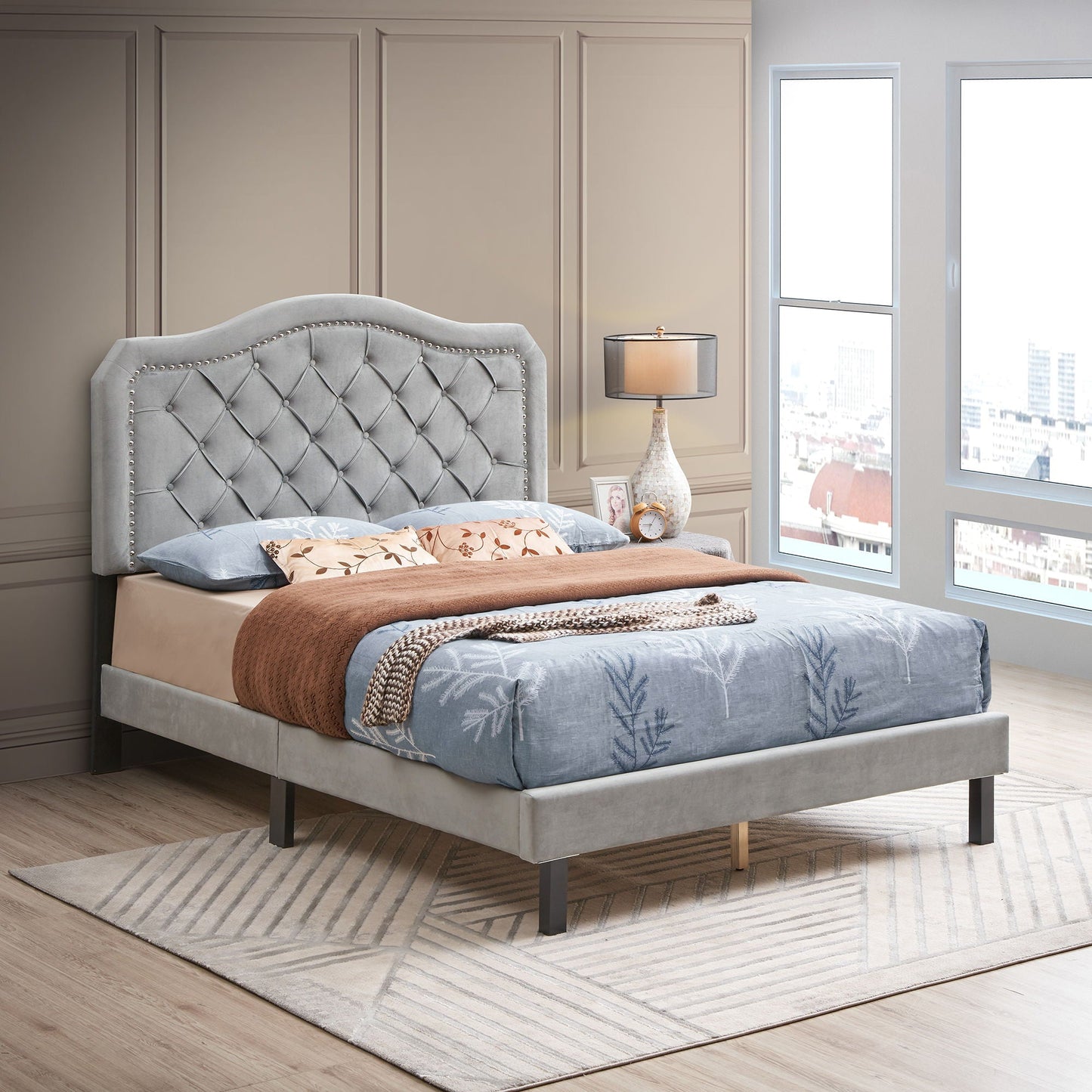 Queen platform upholstered bed with curved tufted gray headboard, nailhead trim, slat support on Tampa Home & Garden Store