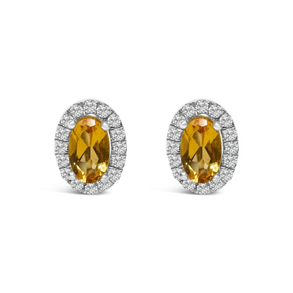 White gold oval yellow gemstone stud earrings with diamond halo by Bids.com on Tampa Home & Garden Store