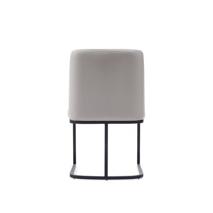 Serena Dining Chair with geometric black metal base, beige upholstered seat HouseOfZazla on Tampa Home & Garden Store