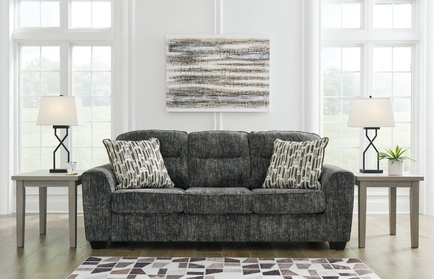 Lonoke living room set stationary sofa charcoal gray fabric with geometric pillows on Tampa Home & Garden Store