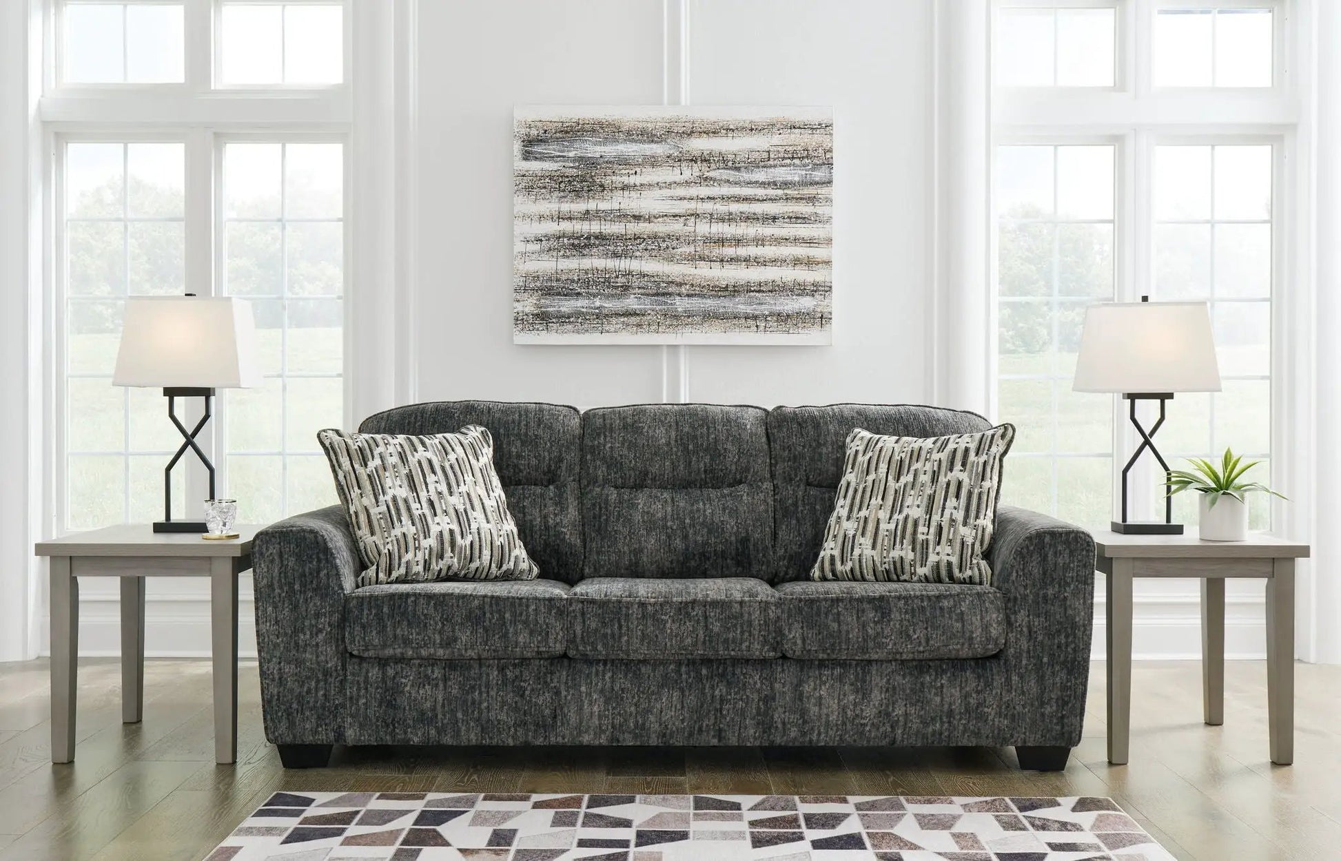 Lonoke living room set stationary sofa charcoal gray fabric with geometric pillows on Tampa Home & Garden Store
