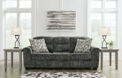 Lonoke living room set stationary sofa charcoal gray fabric with geometric pillows on Tampa Home & Garden Store