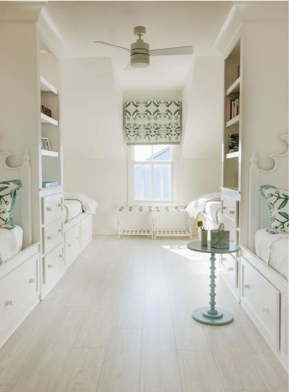 Antonia Wallpaper Blue & Green, repeat pattern by Erin Donahue Tice in a white bedroom on Tampa Home & Garden Store