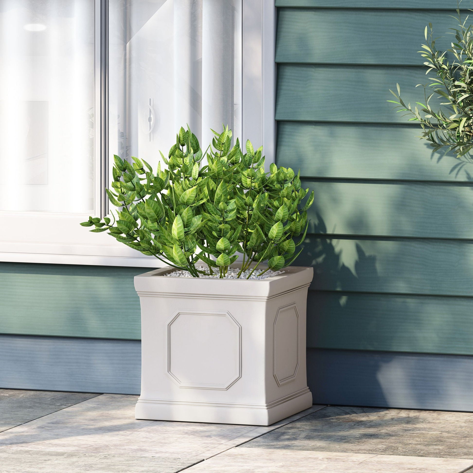 Durable Planter HouseOfZazla white panel planter with green foliage on patio on Tampa Home & Garden Store