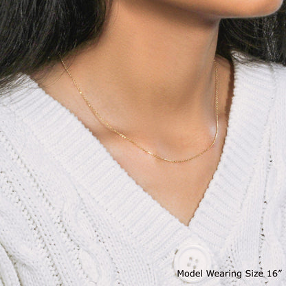 18k yellow gold diamond-cut cable link chain necklace 0.80 mm by Bids.com worn by model size 16 on Tampa Home & Garden Store