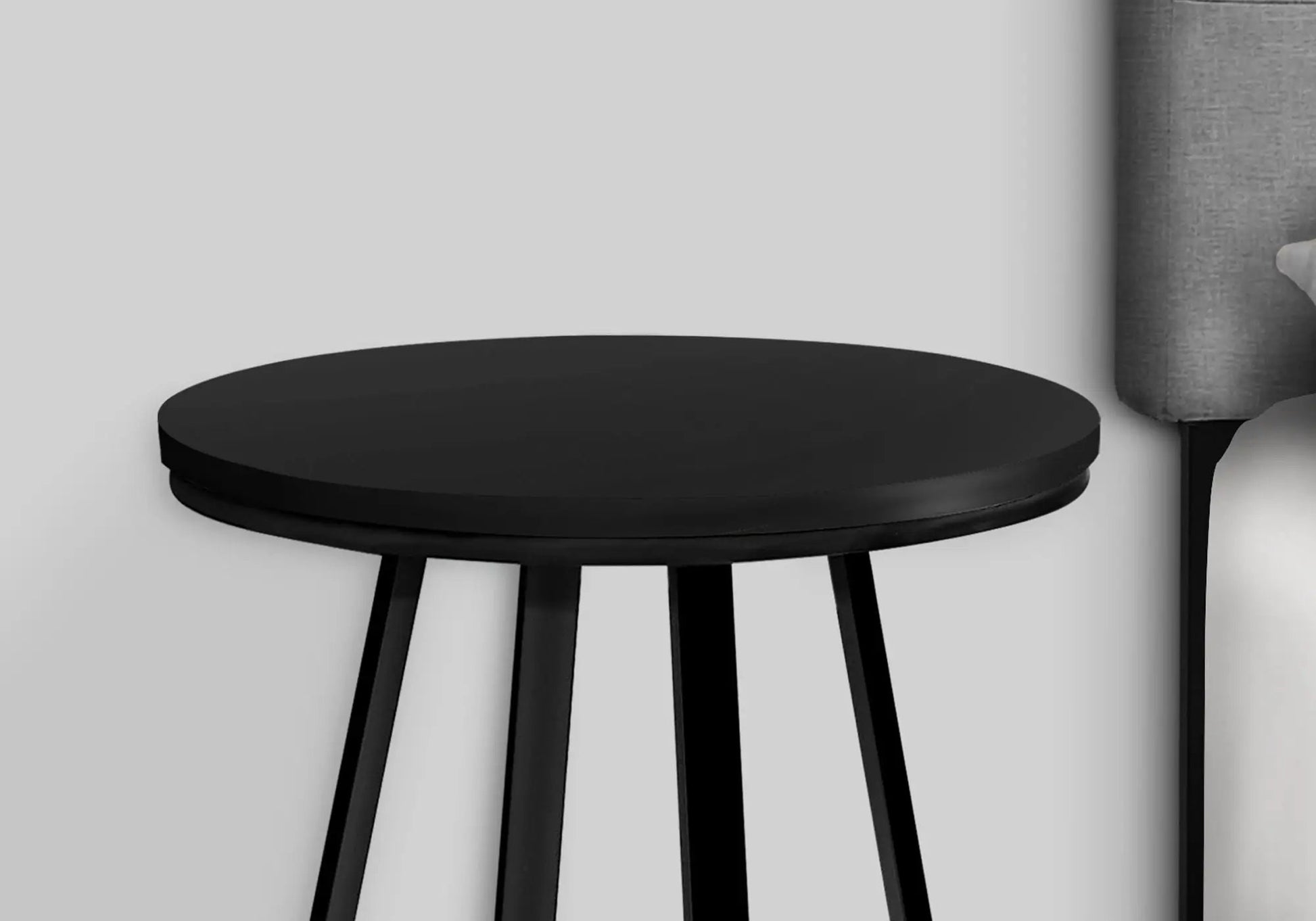 Accent Table round; black top with slender legs for a modern look on Tampa Home & Garden Store