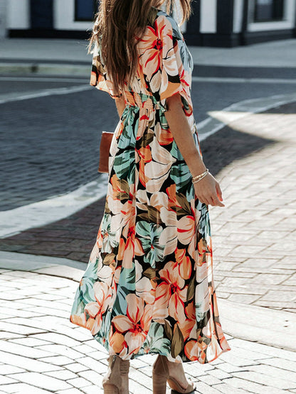 Floral half-sleeve maxi dress with waist tie in peach, teal and ivory print on Tampa Home & Garden Store