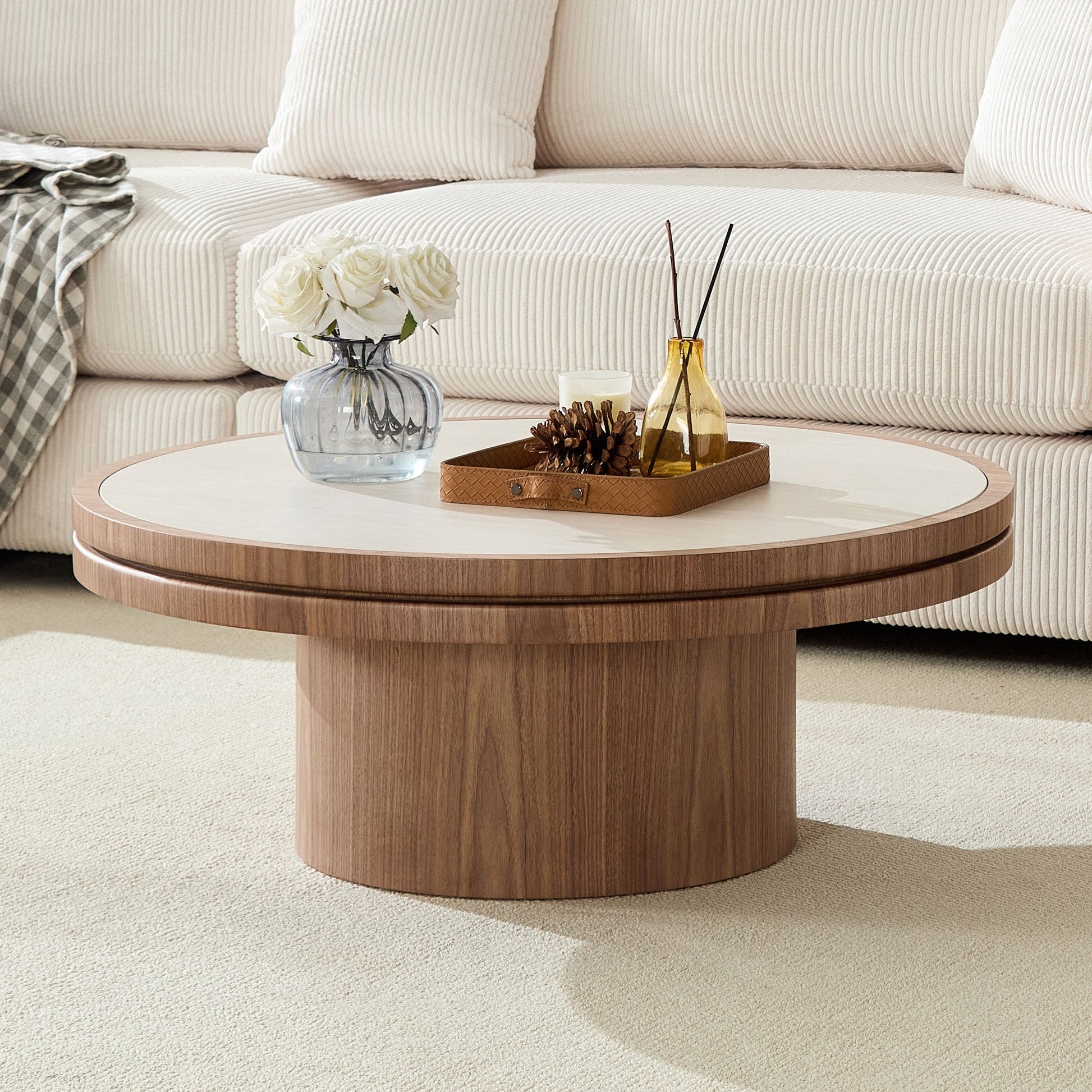 Round walnut coffee table with sintered stone top and pedestal base on Tampa Home & Garden Store