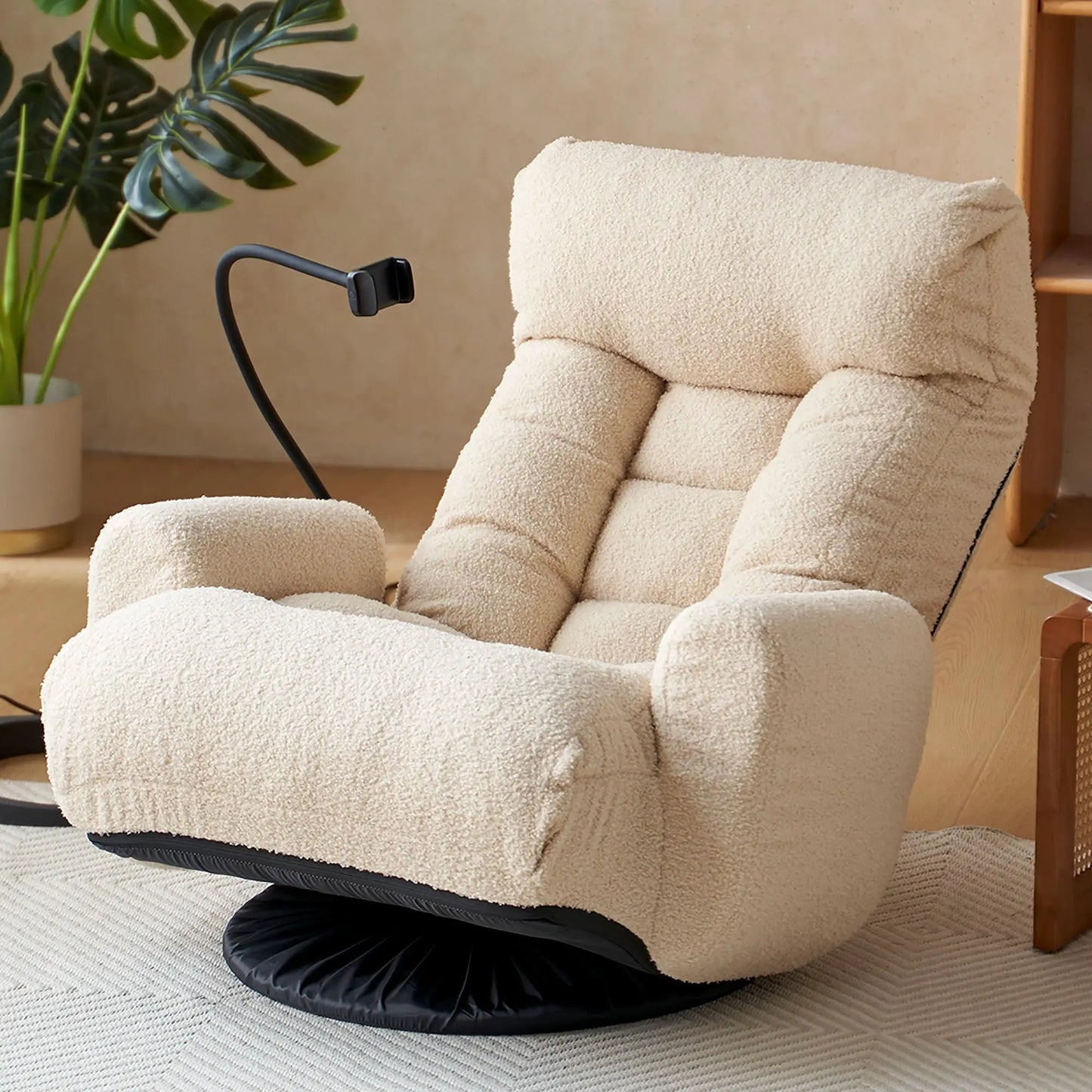 Adjustable swivel lounge chair with 360-degree rotating seat and headrest on a round black base on Tampa Home & Garden Store