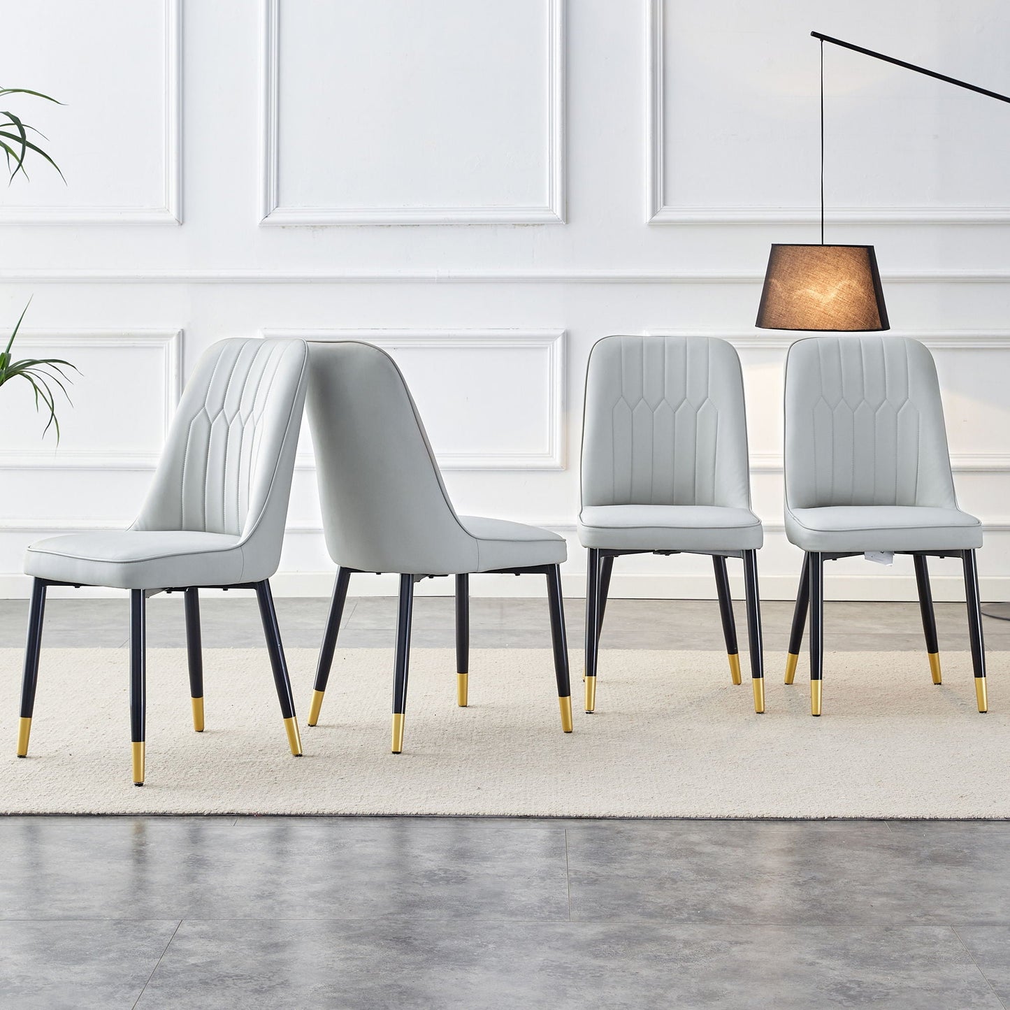 Modern chair with metal legs, gray seat, 4 chairs with black legs and gold tips by HouseOfZazla on Tampa Home & Garden Store