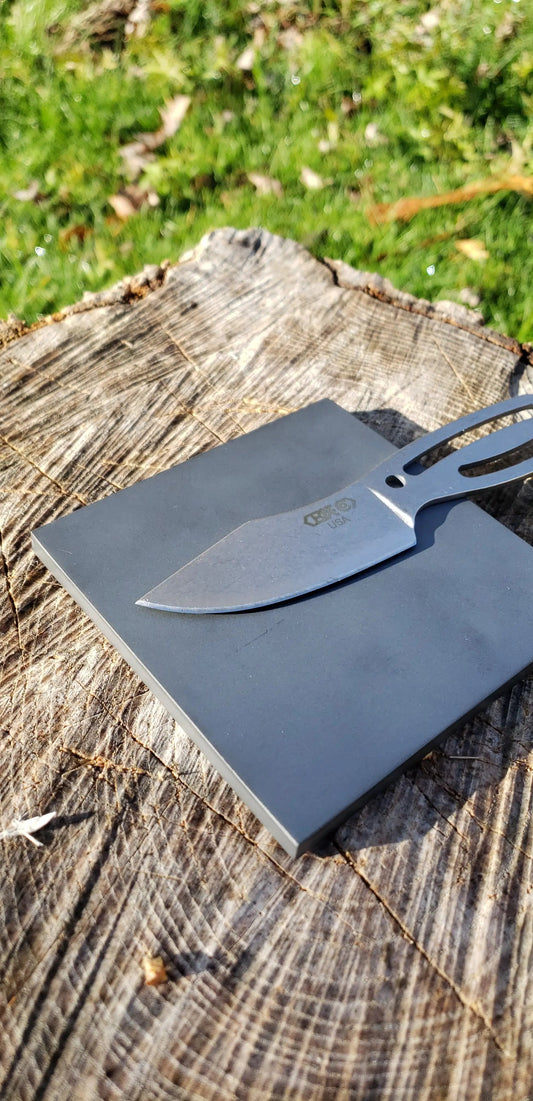 Grimalkin bushcraft knife by Whiskey River Art and Trading; gray blade, skeletonized handle on Tampa Home & Garden Store
